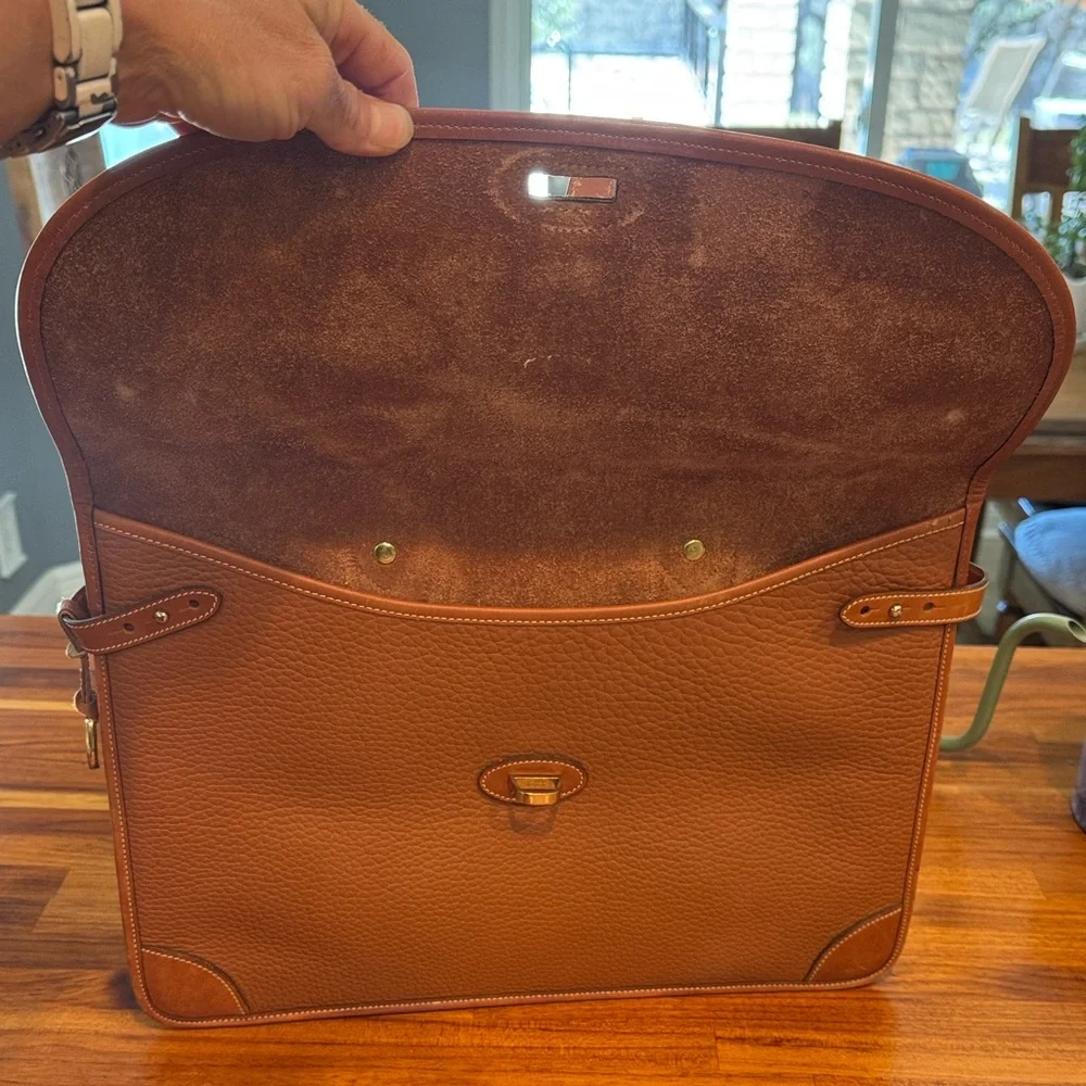 Vintage camel colored Dooney and Bourke all weather leather briefcase/laptop bag